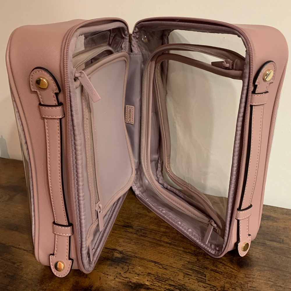 Calpak large pink toiletry case. Clear w/mauve. Great condition!